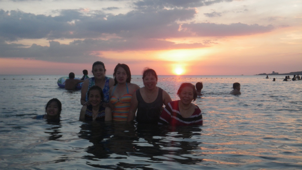 swimming at the sea, sunset at Bagac, Bataan